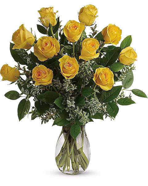 Bouquet of yellow roses in a clear vase 