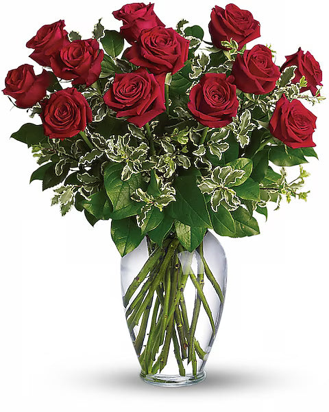 Bouquet of red roses in a clear vase