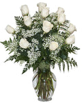 Bouquet of white roses in a clear vase 